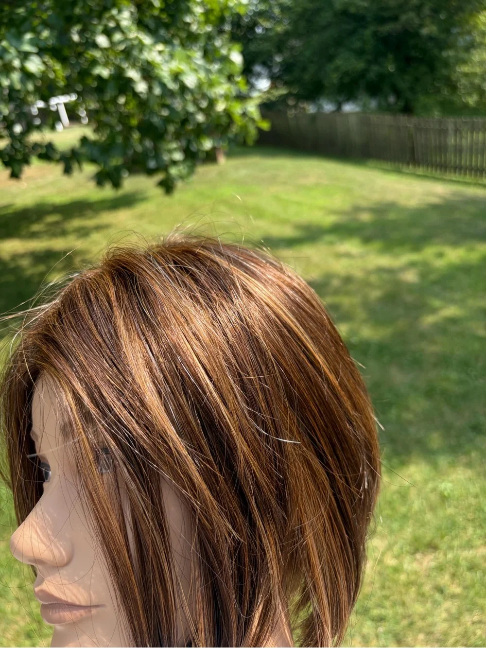 Bobbi Boss Midway brown with honey highlights angled straight Bob synthetic wig